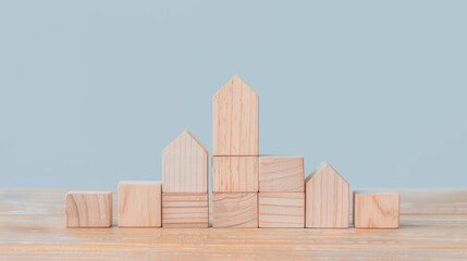 Wooden Block City Skyline, an imaginative display of wooden blocks creatively assembled to depict a vibrant urban business environment, showcasing innovation and design.