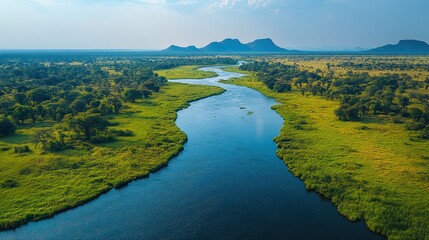 A river with a green grassy bank