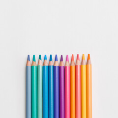 multicolored pencils on a white background