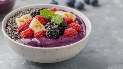 Bowl of acai topped with fruits and seeds, packed with antioxidants to boost the immune system antioxidant  immune booster