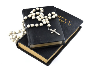 Holy bible and crosses on a white background