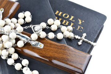Holy bible and crosses on a white background
