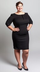 Fototapeta premium Confident woman in black dress