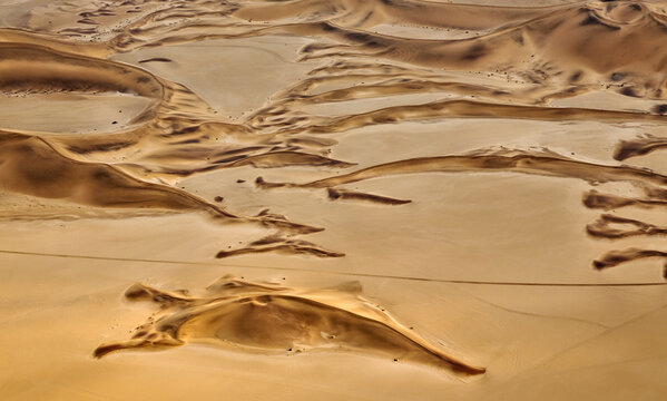 Arial view of Sand dunes in the Namib Desert near the town of Swakopmund. Aerial view. Namib Desert, Namibia.
