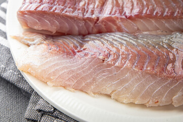 fillet raw white fish cod or halibut fresh meal food snack on the table copy space food background rustic top view