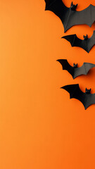Fototapeta premium Halloween minimalist background with Black bats on bright color backdrop