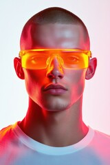Expressive man with orange transparent glasses.