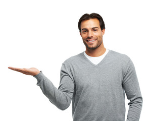 Naklejka premium Hand, mockup space and portrait of man in studio for marketing, advertising or promotion menu. Happy, choice and person with presentation palm gesture for option, vote or decision by white background