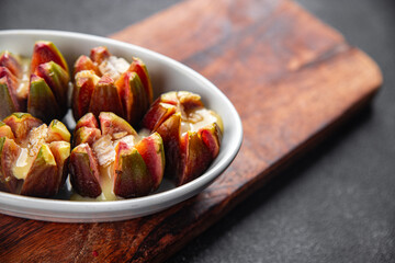 figs baked cheese camembert or brie meal snack on the table copy space food background rustic