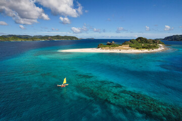 Beautiful islands and traditional boat of Okinawa in Japan