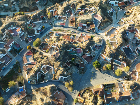 Aerial view of The cave quarter in Guadix. Aerial view. Drone shot. Granada province, Andalusia, Spain.
