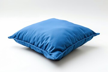 Blue pillow against white backdrop