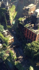 Fototapeta premium An enchanting aerial perspective where whimsical fantasy worlds intertwine with urban life
