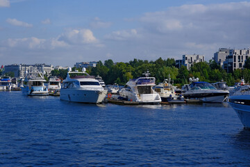 Fototapeta premium Tourist pleasure white yachts at the marina.