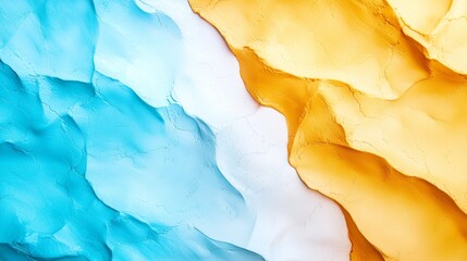 Naklejka premium A tight shot of a blue, white, and yellow wall, featuring a sizable splash of paint