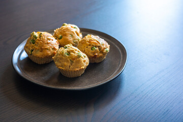  Savory Muffin with Pea, Ham, and Cheese Close-Up on Dark Background