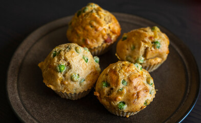  Savory Muffin with Pea, Ham, and Cheese Close-Up on Dark Background