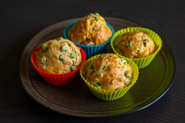  Savory Muffin with Pea, Ham, and Cheese Close-Up on Dark Background