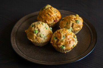  Savory Muffin with Pea, Ham, and Cheese Close-Up on Dark Background