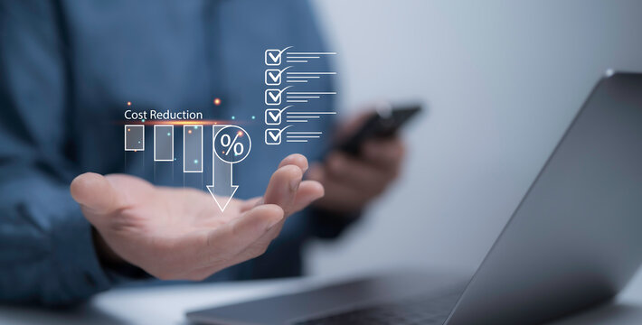 Person hold cost icon virtual screen, symbolizing the concept of cost reduction in business finance. Focus on budget management, cost optimization, achieving economic saving and financial efficiency