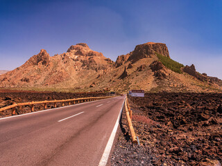 spot in Tenerife with many red rocks and beautiful mountain landscape background