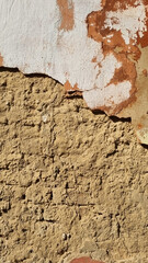 Peeling paint on an old wall. Grunge background for design.Selective focus