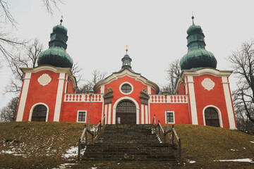 Obraz premium Discover the unique architecture of the Calvary in Banska Stiavnica, Slovakia, set against a winter landscape with historical significance