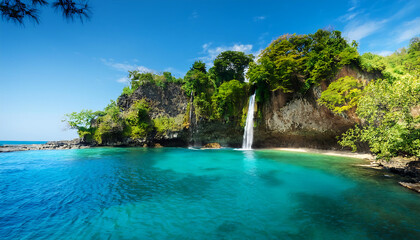 Fototapeta premium tropical lagoon cliffs waterfall flowing emerald waters