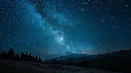 Fototapeta premium lake surrounded by mountains on a starry night