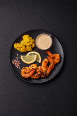 Boiled tiger prawns with white sauce and lemon