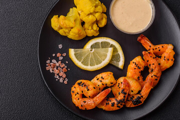 Boiled tiger prawns with white sauce and lemon