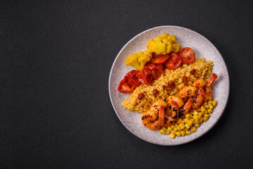 Boiled tiger shrimps with porridge, tomatoes and corn