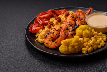 Boiled tiger shrimps with porridge, tomatoes and corn
