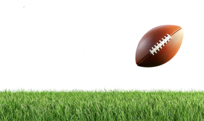 Brown leather American football floats above green grass, isolate on transparent background, cutout, png