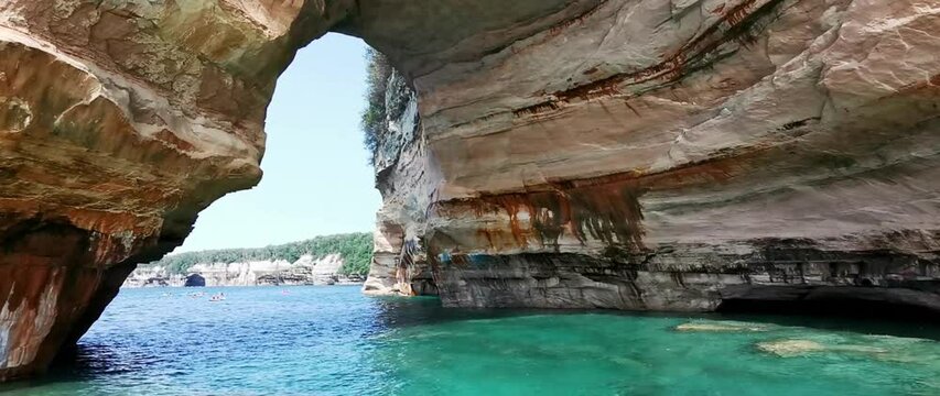 A boat tour through Lovers Leap Arch at Pictured Rocks National Lakeshore of Lake Superior, Munising, Michigan, USA