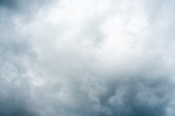 Dark dramatic storm cumulus clouds in autumn. An impending storm, hurricane or thunderstorm. Bad weather.