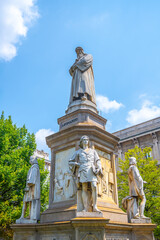 A striking sculptural group honors Leonardo da Vinci in Milan's Piazza della Scala, featuring...