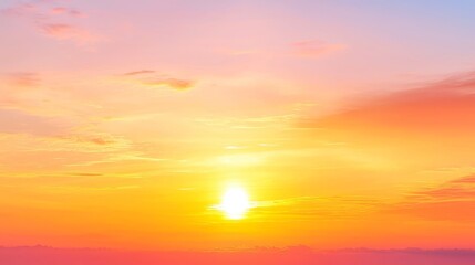 Obraz premium Vibrant Sunset Over Horizon, A stunning panorama showcasing a fiery orange sky illuminated by a brilliant sun, creating an expansive scene of serene beauty and tranquility.