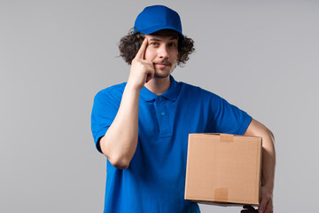 Handsome smart post courier with gesture - you, think about it.Thinking positive
