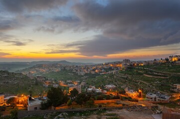 View on streets with night lights in old historical biblical city Bethlehem in palestine region in Israel on evening. Christmas time of peace and love.