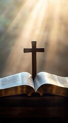 Cross resting on top of an open Bible, light streaming down from above, symbolizing the connection between faith and the Word