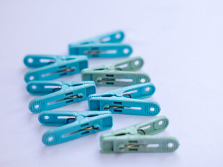 clothespin letter s photographed close up from a side angle with isolated background