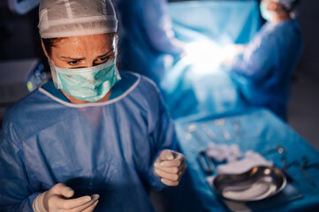 Healthcare professional in operating room focusing before surgery