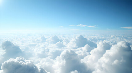 Fototapeta premium Aerial View of Fluffy White Clouds in a Vast Blue Sky, an Enchanting Panorama of Nature's Beauty