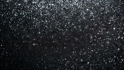Obraz premium 黒色のラメ・グリッターの背景画像（A background image of black glitter.）