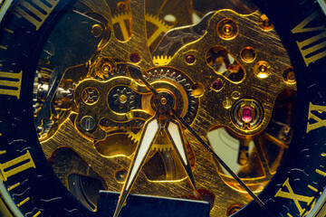 Clock mechanism, macro winding,Close-up of the internal mechanism of a vintage analog self-winding watch, focusing on the hands. Some internal reflections from dust speckles can be