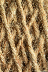 Fototapeta premium Natural made macro rope texture,Coarse rope made of natural fiber material - sisal plant. Macro photo of texture, background