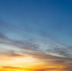 Colorful clouds and sky,Dusk, Sunset Sky Clouds in the Evening with colorful Orange, Yellow, Pink and red sunlight and Dramatic storm clouds on Twilight sky,