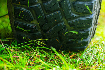 Off-road tires,Closeup photo of car wheel on steppe terrain,4x4 all-terrain vehicle tire