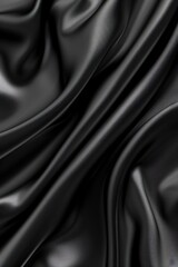 Fototapeta premium Elegant black fabric with smooth layers creating a modern and stylish design